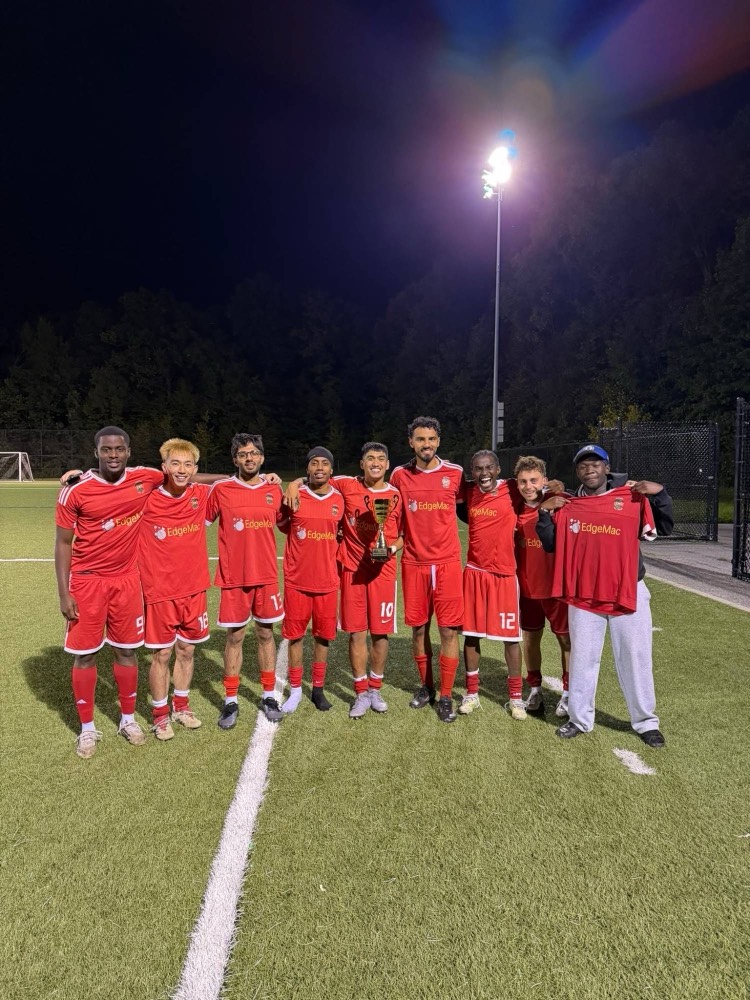 My soccer team with the Division 2 trophy